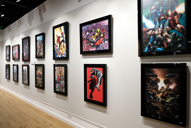 Previous Marvel artworks from The Legacy Collection are displayed on a gallery wall 