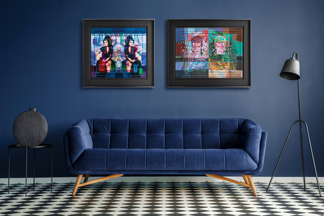 Stuart McAlpine Miller's two Spring/Summer 2021 artworks are pictured in a modern room with navy walls and a navy sofa